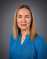 A picture of a woman smiling.